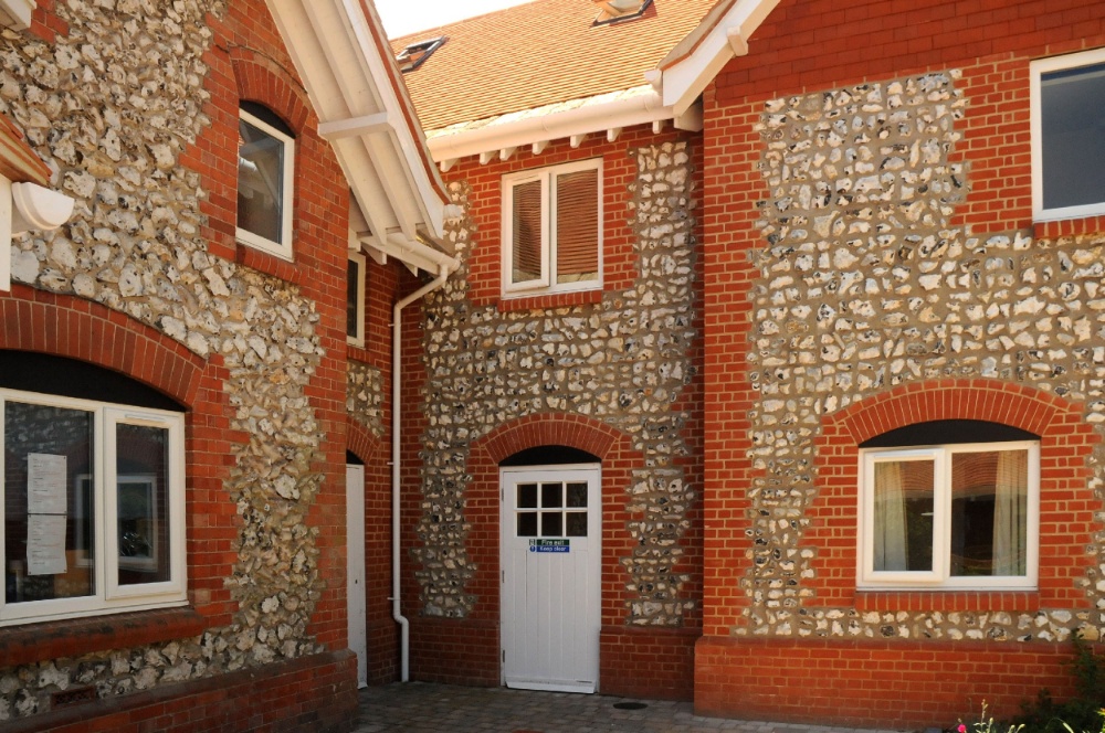 A house built with ibstock berkshire orange bricks.