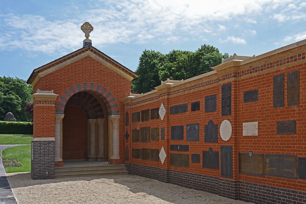 A building and wall built with ibstock berkshire orange bricks.