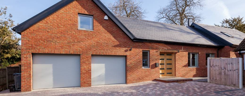 A new build brick house and driveway.